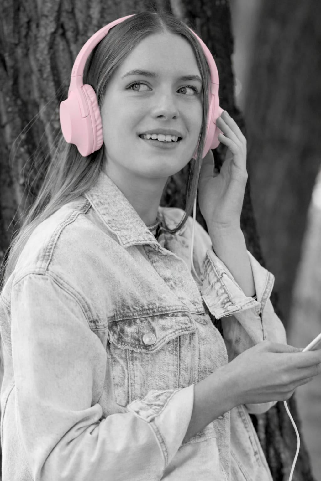 Woman choosing a sweater from her wardrobe